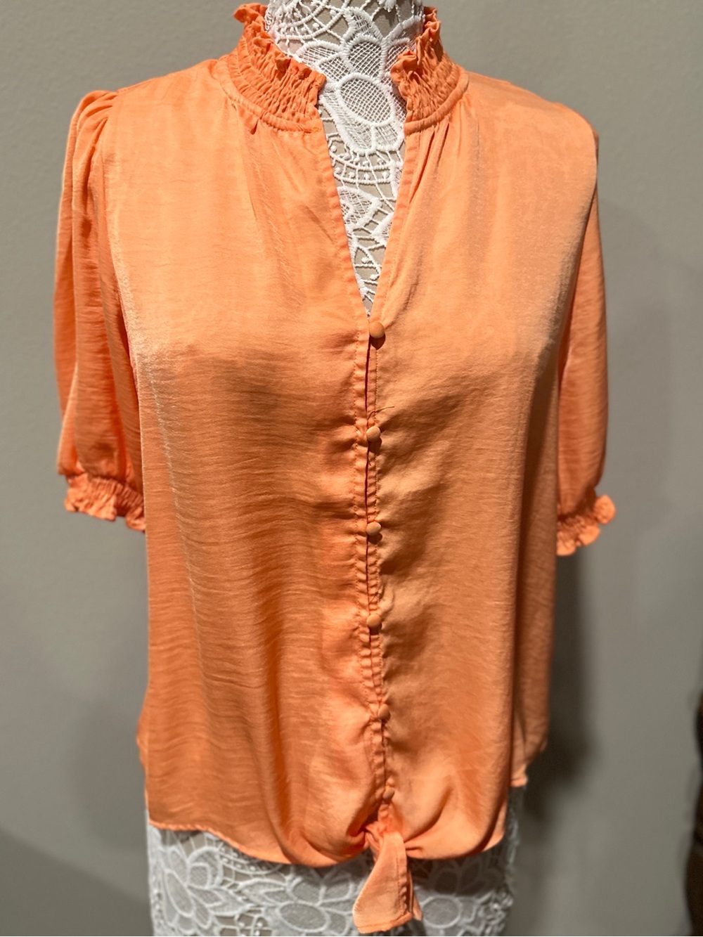 Peach-Orange Ruffle Neck Button-Front Blouse that ties in front. Summer top